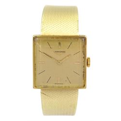 Longines gentleman's 14ct gold manual wind wristwatch, Cal. 428, champagne dial with baton hour markers, on integral 14ct gold bracelet, London import mark 1972