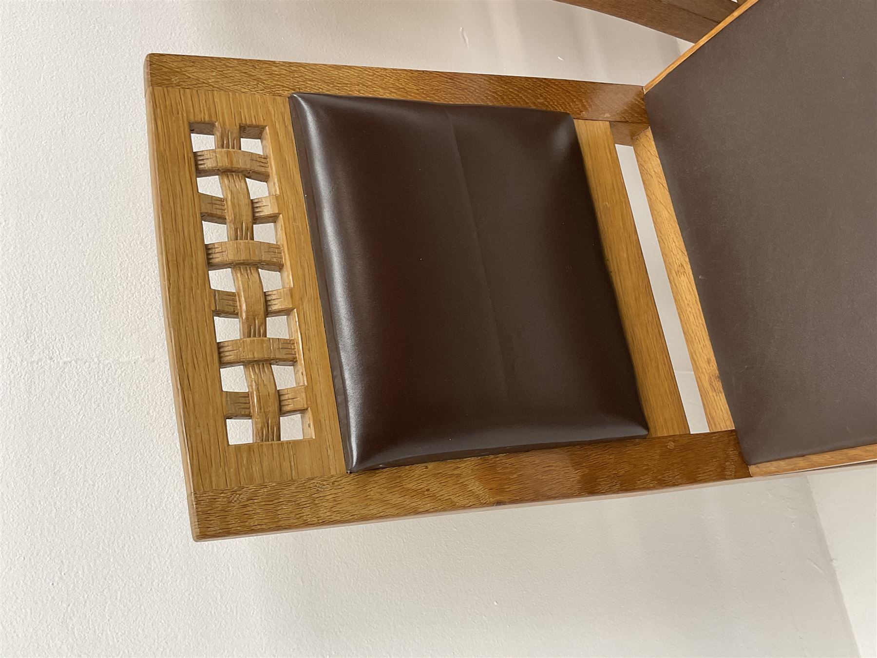 'Lizardman' set six dining chairs, two carvers and four side chairs, carved and pierced lattice top rail over cushioned back and drop in seat upholstered in brown leather, by Derek Slater of Crayke