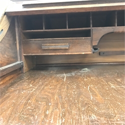 Early 20th century oak shaped tambour roll top desk , five graduating drawers, single cupboard interior, plinth base, W138cm, D87cm