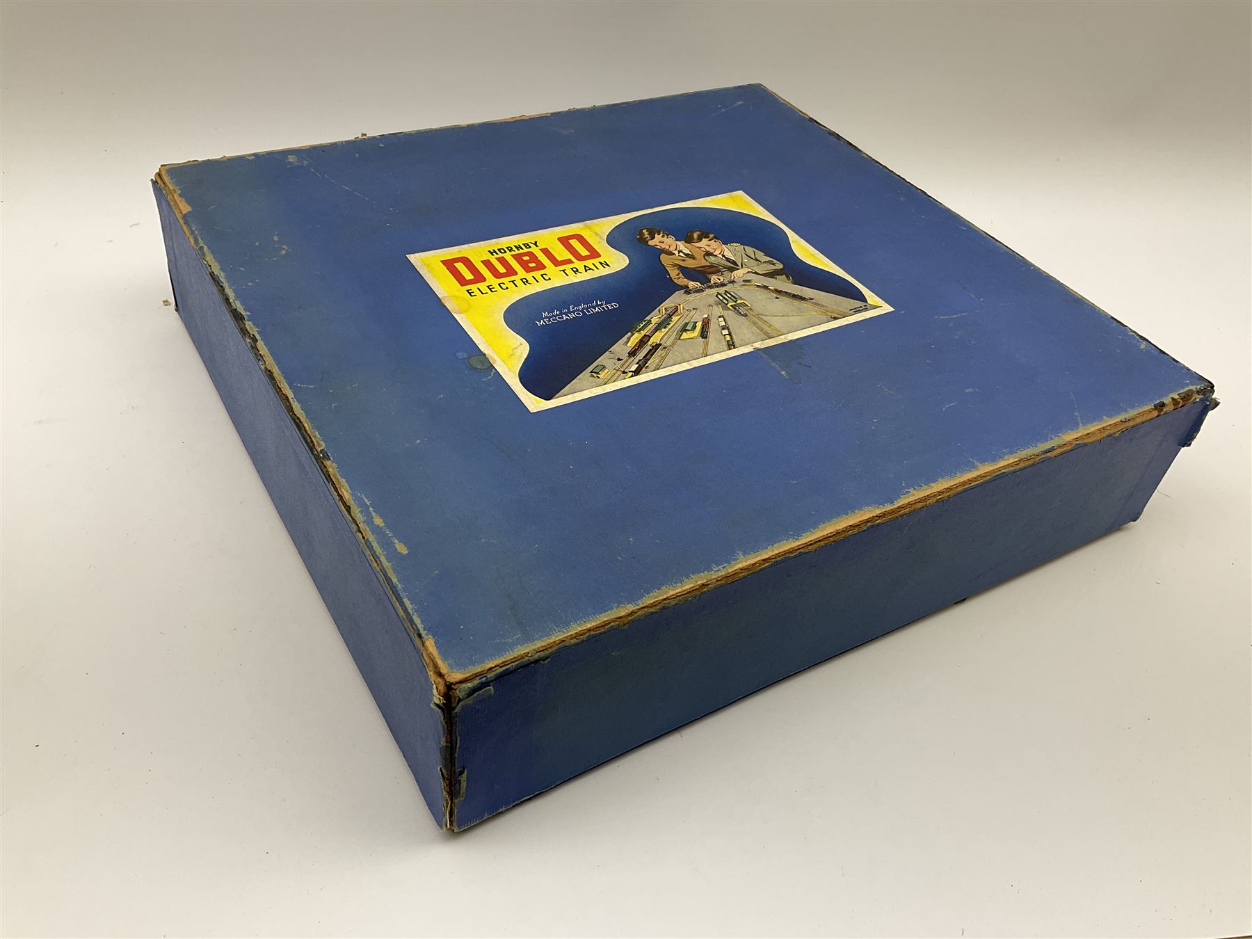 Hornby Dublo - three-rail EDG7 Tank Goods Train set with GWR 0-6-2 Tank locomotive No.6699, two wagons and brake van, quantity of straight and curved track and controller, boxed with instructions and oil bottle.