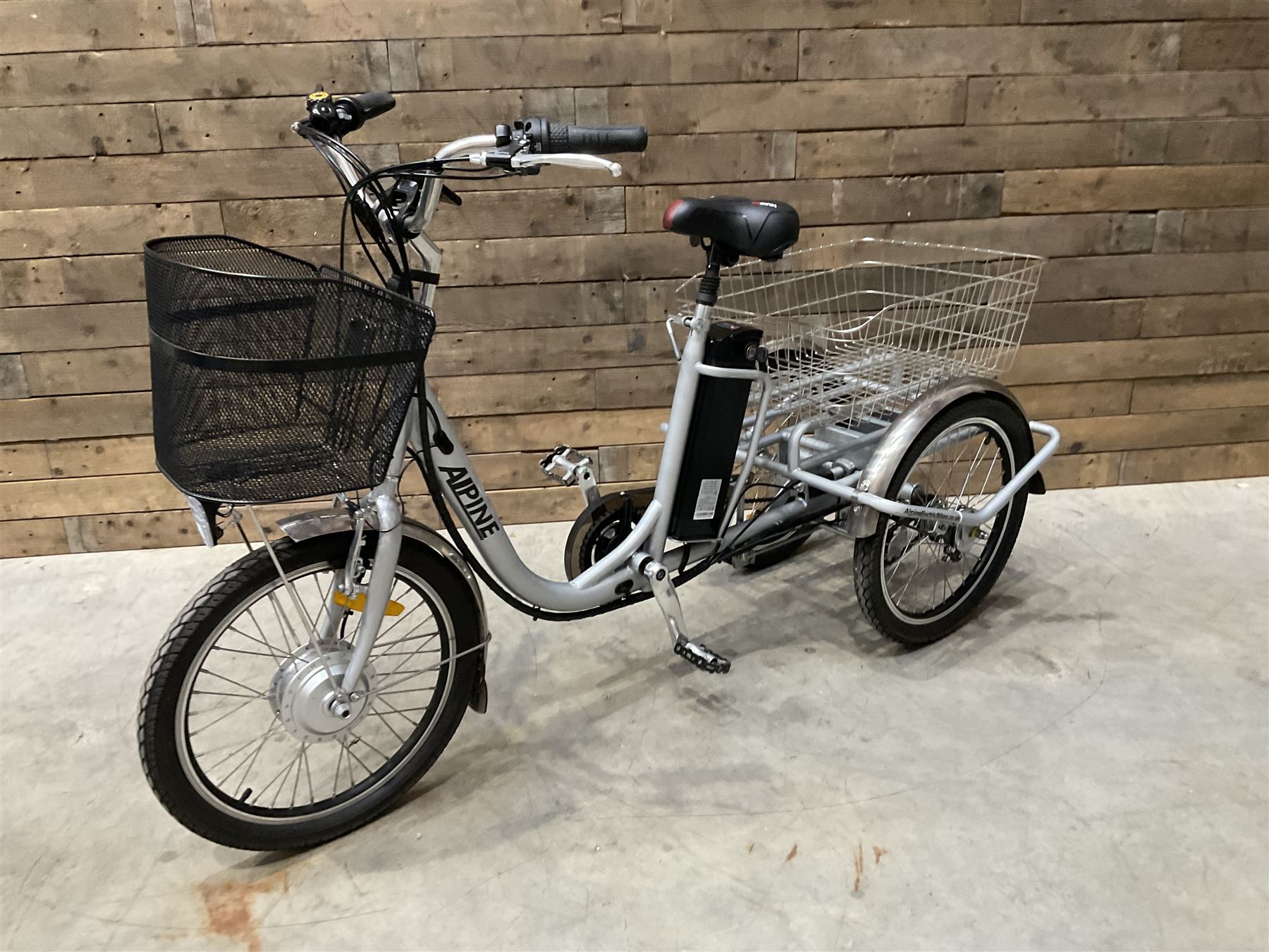Alpine electric tilt trike - power assisted with throttle (no need to pedal), 15.5mph with 40 mile range, only 37 miles from new, silver finish, removable battery with charger, YoungDo gell seat with cover, £2749 new.