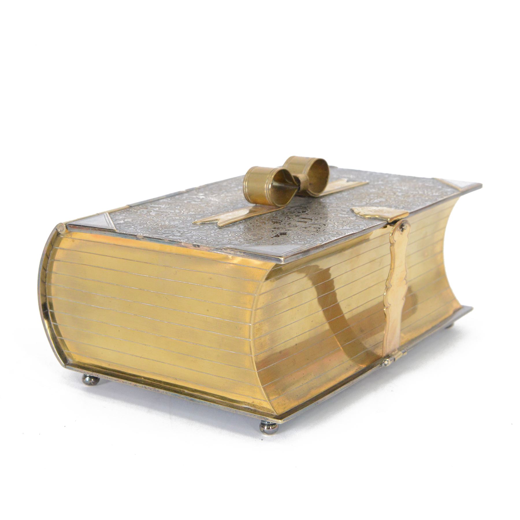 Late Victorian silver plated novelty biscuit box modelled as a presentation book, by Deykin & Sons, Birmingham, the spine engraved 'BISCUITS', the hinged cover with chased foliate decoration and mounted gilt bow secured by a gilt clasp with registration lozenge, opening to reveal a gilt interior with hinged scroll pierced grille, including bow H10.5cm W21.5cm D14.5cm