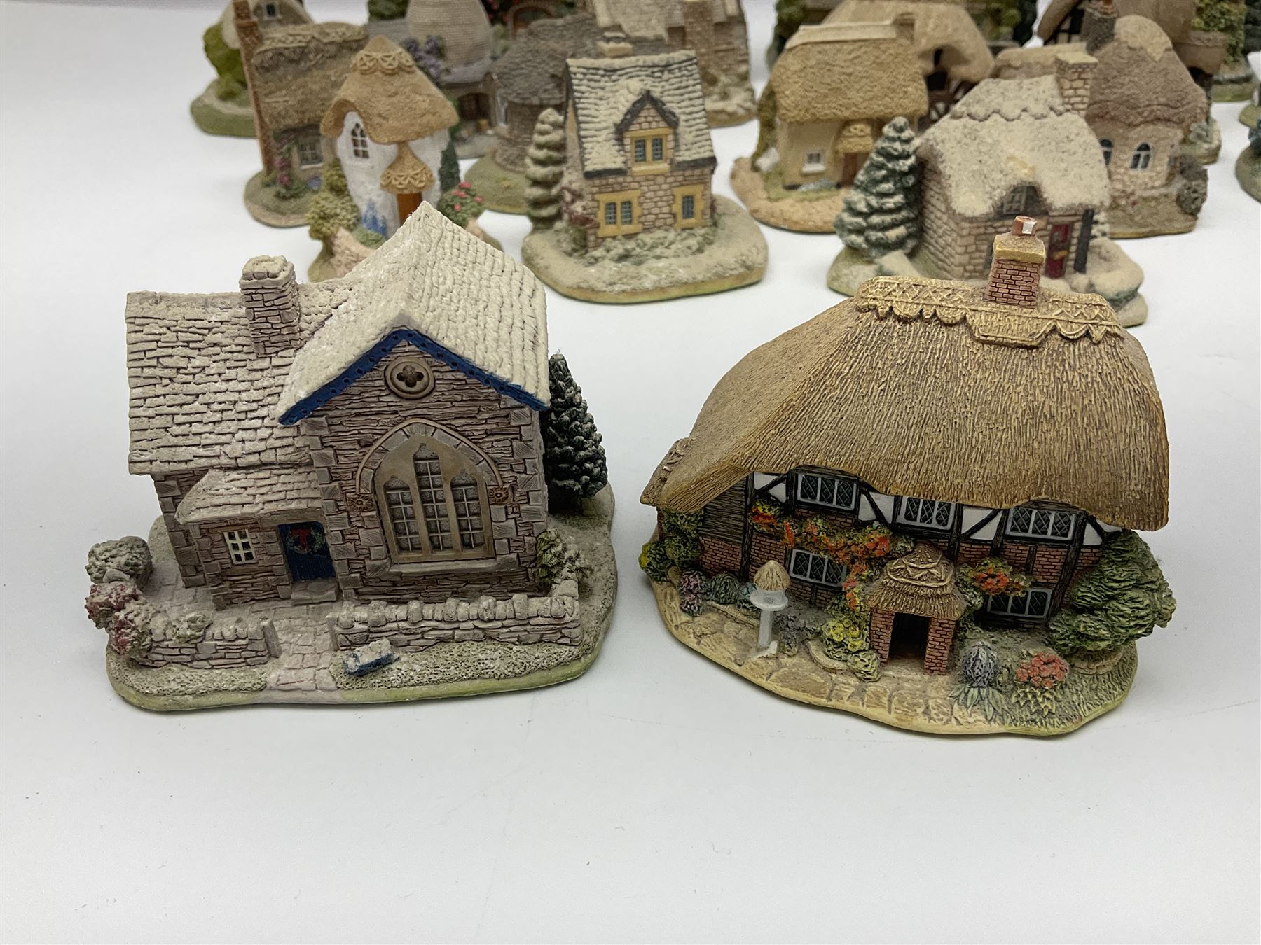 Thirty Lilliput lane, to include Hill Top, Bottle Oven, April Cottage, Thimble Cottage, Honeysuckle III, Gullivers Pantry etc