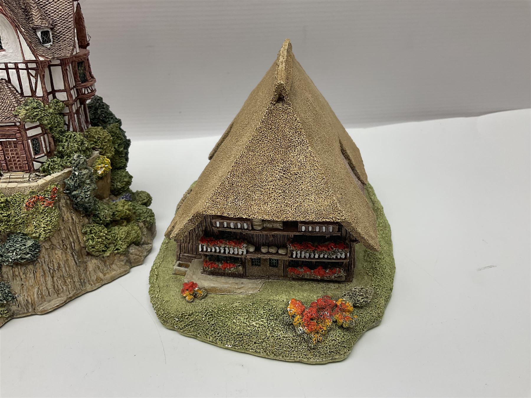 Sixteen Lilliput Lane models from the European collections, to include Dutch Collection; Aan de Amstel, Wipmolen, French Collection; Cabane De Guardian La, Porte Sachoenenberg La, German Collection Alte Schmiede, Das Rathaus, etc some with original boxes and deeds 