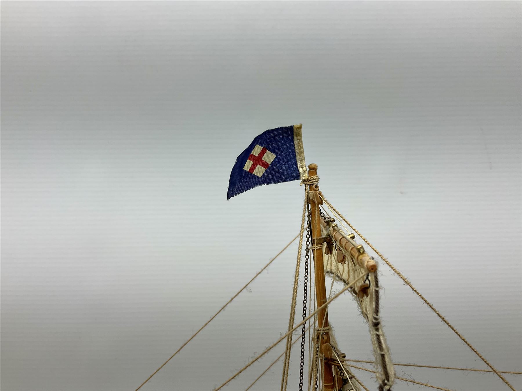 Three masted kit built sailing ship with cloth sales, deck fittings and full rigging, on open display, L110cm, H80cm  