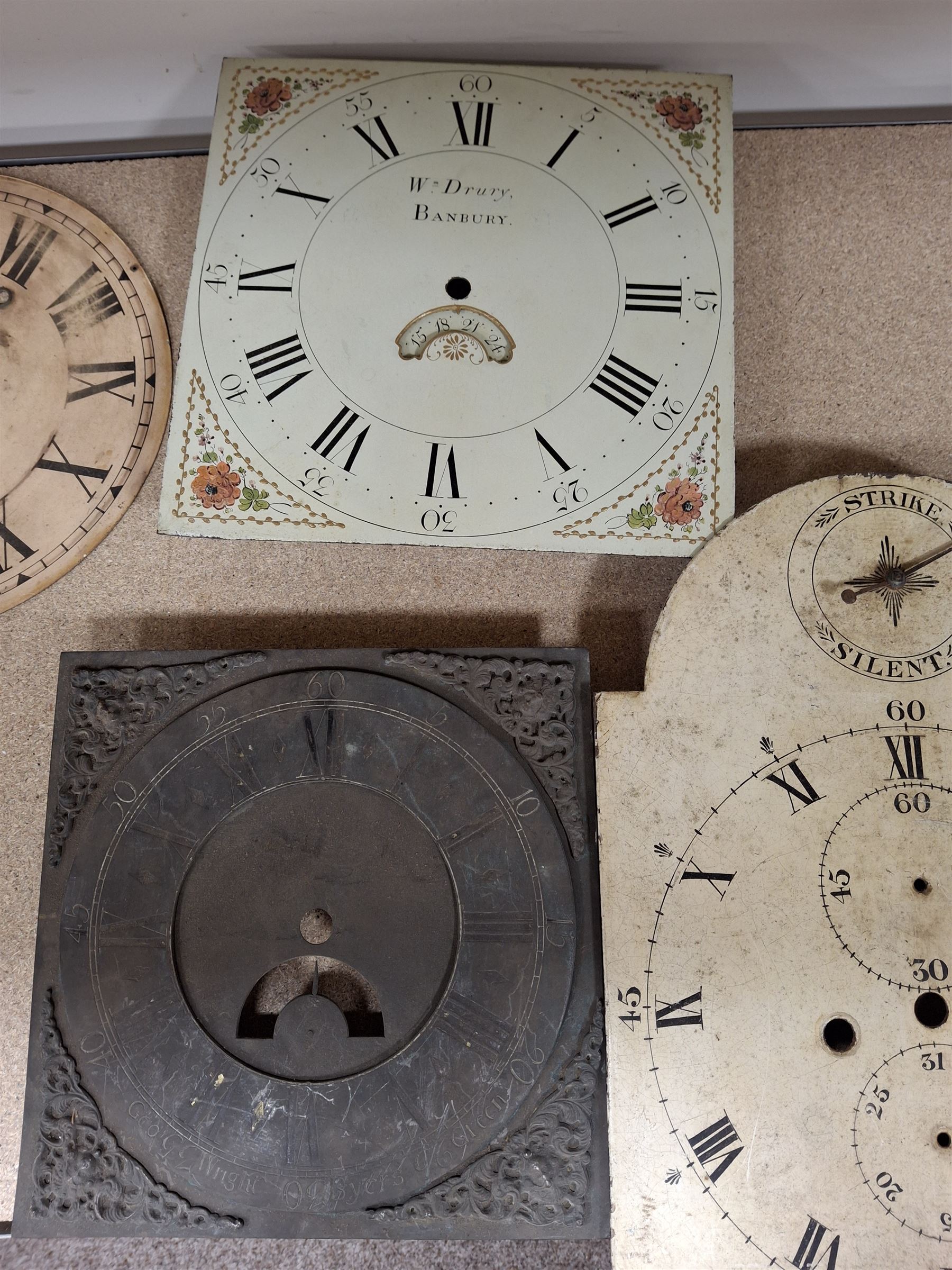 Approximately twenty-two longcase and wall clock dials, 18th century and later, included painted and brass examples