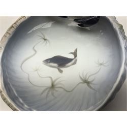 Pair of Royal Copenhagen bowls by Erik Nielsen modelled as baskets and mounted with crabs, the larger painted with a fish amongst seaweed to the centre, model no 2465 and 3131, with painted and printed marks beneath, largest D23cm