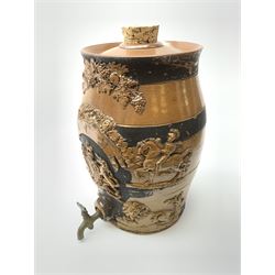 A Victorian salt glazed stoneware rum barrel, decorated with applied fruiting vines, flowers on the Union, Royal Crest, knights on horseback and lions, no including cork stopper H33cm.
