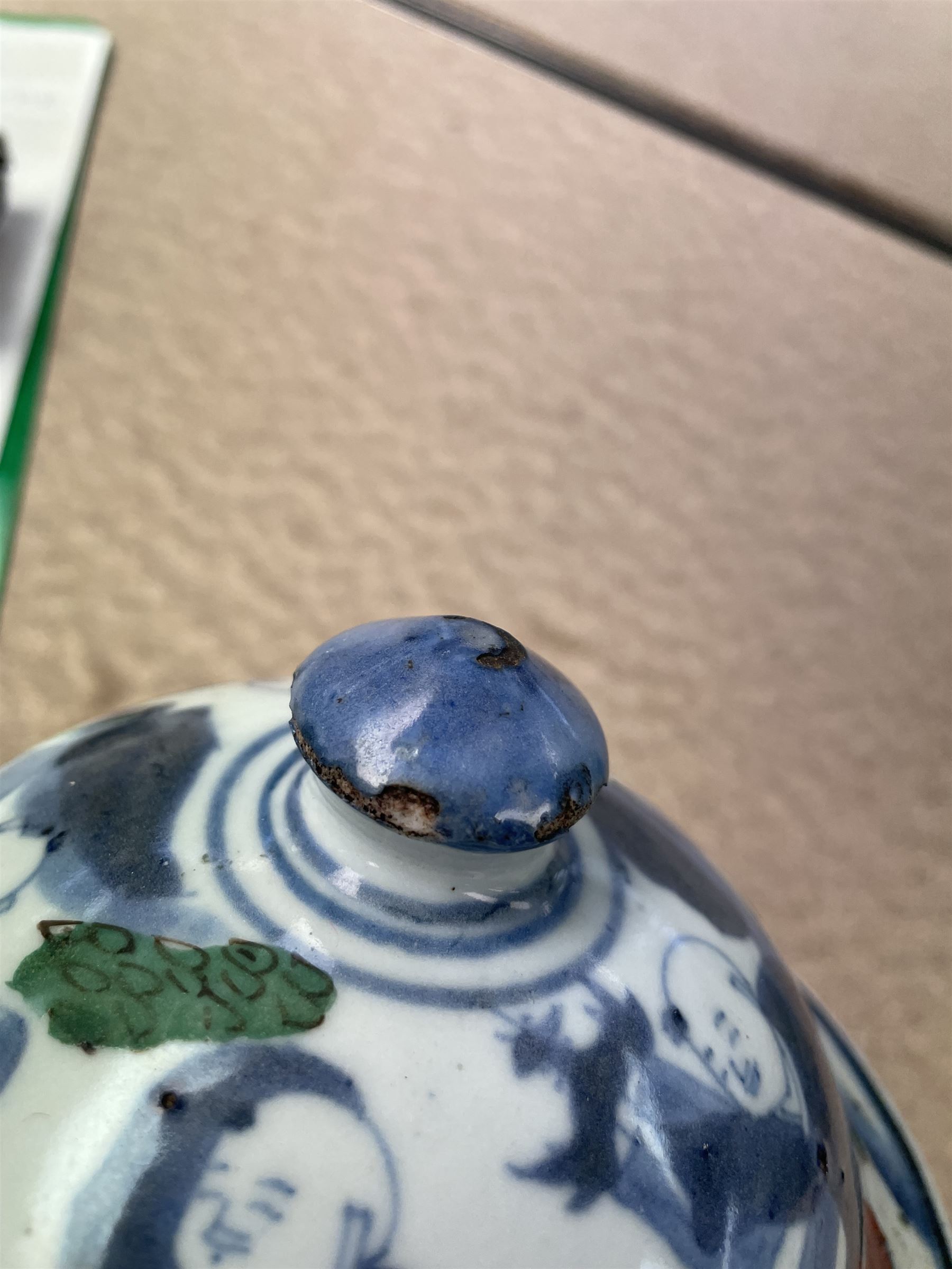 17th century Transitional period Chinese Wucai vase and cover, of baluster form, the body painted with ladies upon a terrace, and figures upon horseback and attendants within a fenced garden, the domed cover with knop finial painted with boys at play, H37cm
