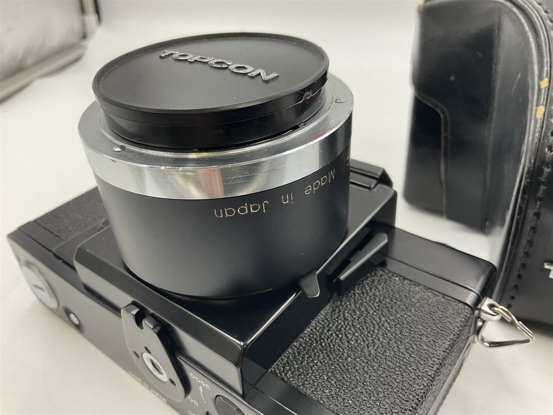 Topcon RE Super camera body, serial no.4681129, with 'RE. Auto-Topcor 1.8/5.8cm' lens, serial no. 11669018, in leather case