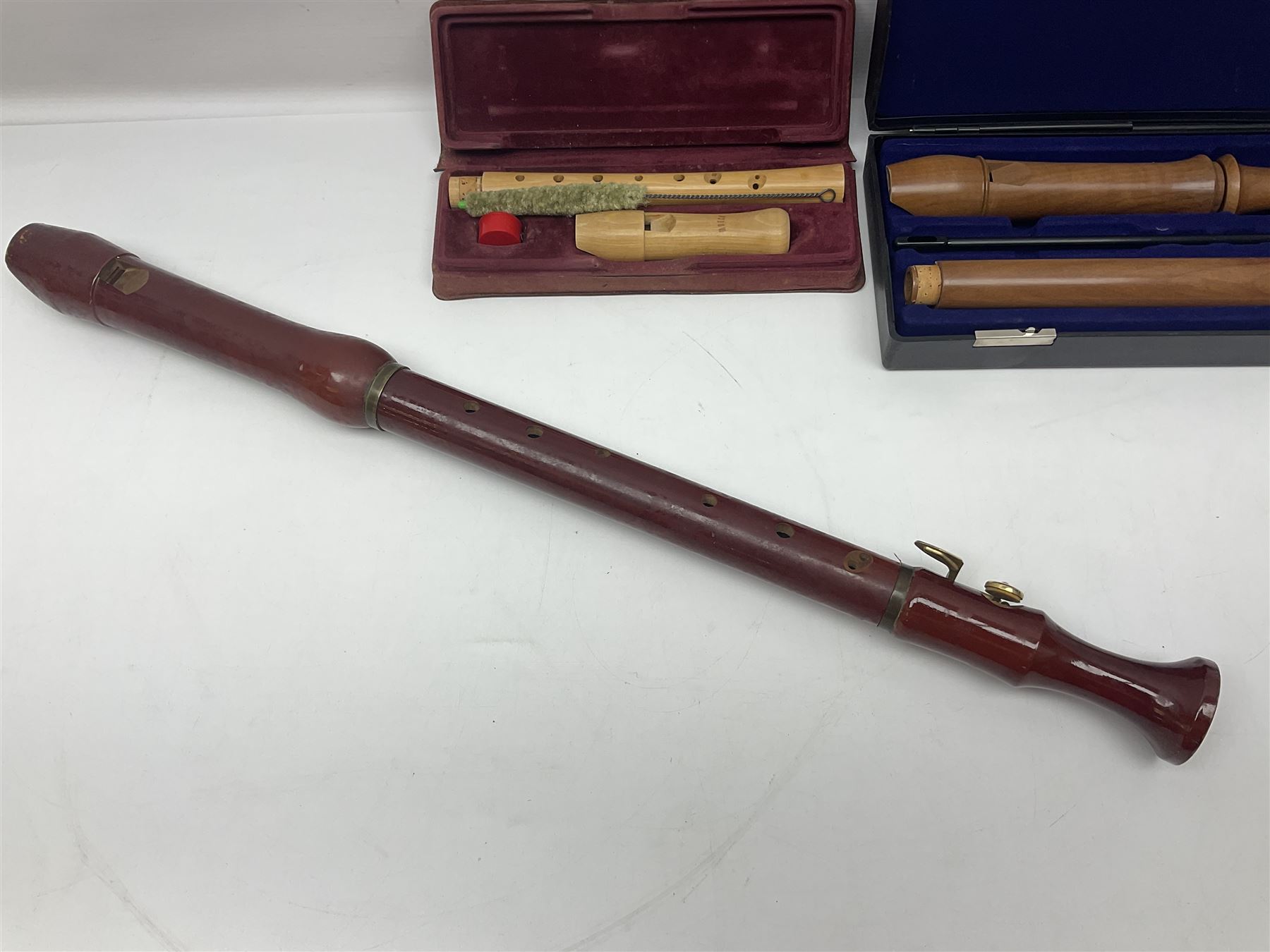 Three wooden recorders - 1970s Schotts 'Concert' three-piece tenor; 1990s Dolmetsch treble, cased; and 1980s Moech descant, cased (3)