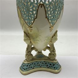 19th century Royal China Works Worcester pot pourri vase and cover of ovid form raised on three scrolling legs headed with lion masks and upon a triform reticulated base, printed marks beneath, H24cm