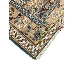 Small Persian red and blue ground rug (115cm x 88cm); and a Persian beige ground rug with two elongated medallions (162cm x 132cm)