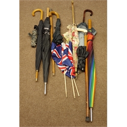  Early 20th century medium oak corner stick stand with umbrellas and sticks  