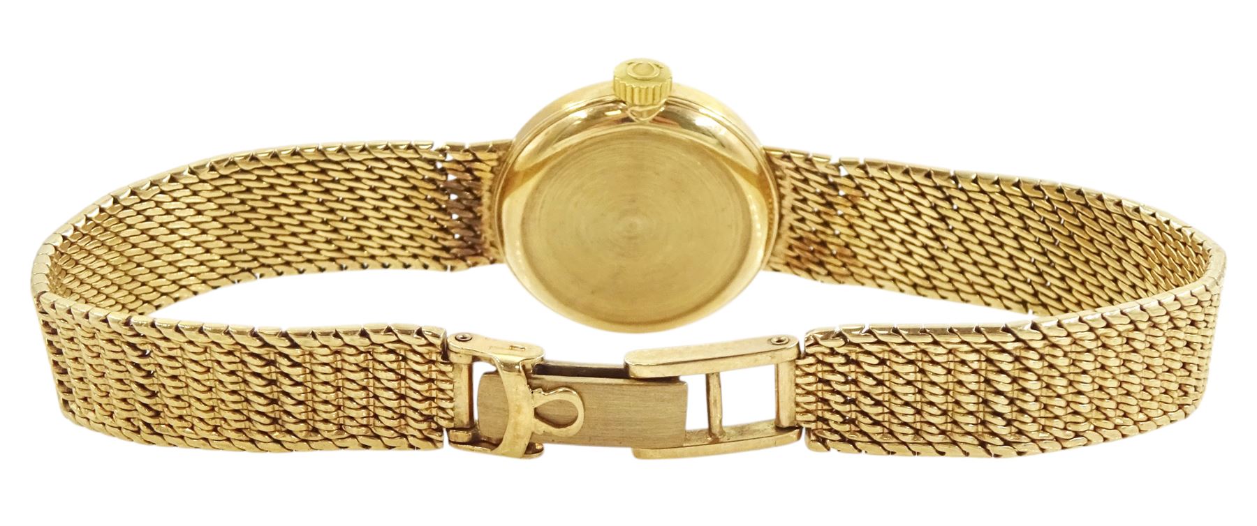 Omega ladies 9ct gold manual wind wristwatch, silvered dial with baton hour markers, on integral 9ct gold bracelet, London 1966