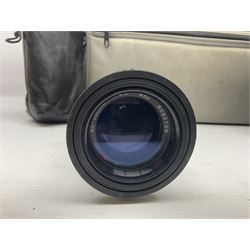 Canon A1 35mm camera body serial no 741264, with 'Tokina AT-X 28-85mm 1:3.5-4.5' lens serial no 821679, 'Canon FD 50mm 1:1.8mm' lens and other camera equipment 