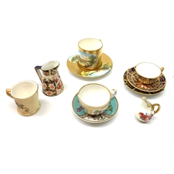 A selection of cabinet miniatures, comprising a Royal Crown Derby Imari pattern teacup, saucer, plate and jug, a Royal Worcester blush ivory floral painted cup, a Royal Worcester ewer, a Helena Wolfsohn teacup and saucer,  and a Coalport cup and saucer, all marked beneath. 