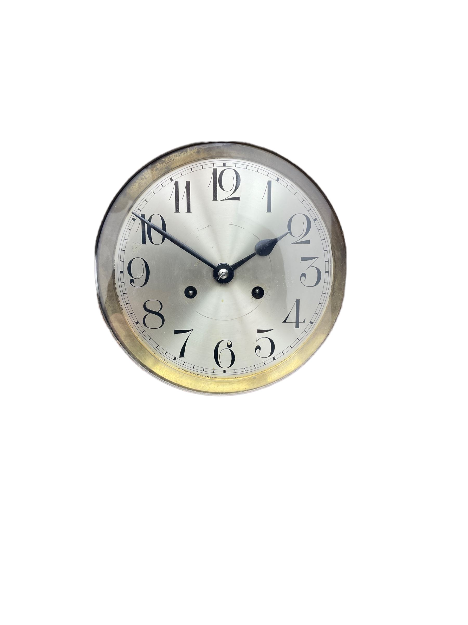 A 1930's wall clock in an oak case with a full-length door, three glazed panels and visible pendulum, case with a shaped pediment and applied carving, 6'' silvered dial with Arabic numerals, minute track and steel baton hands, eight day going barrel movement striking the hours on a gong.

	



