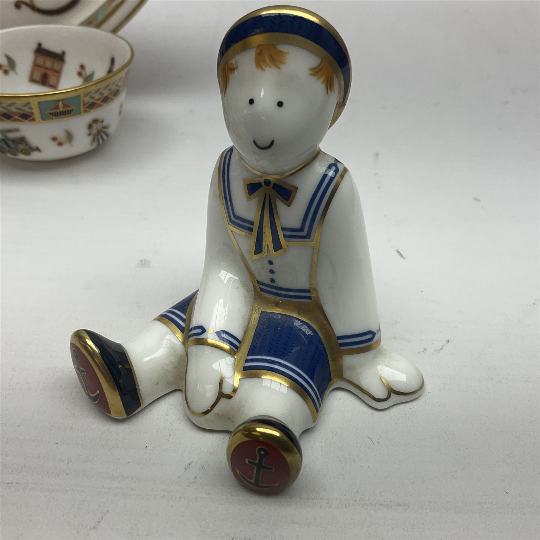 Royal Crown Derby Treasures of Childhood cabaret set, comprising tray, milk jug, sucrier, teacup and saucer, together with two Royal Crown Derby Treasures of Childhood paperweights Fleur and Ragdoll Sailor and Teddy bear paperweight, all paperweights are without stoppers