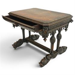 Victorian Jacobean Revival heavily carved oak centre table , rectangular top with canted corners and carved edge, fitted with single frieze drawer with central carved green-man handle with flanking gadrooning, the corners with lion masks, raised on fluted supports terminating to splayed stylised dolphin feet with castors, united by stretcher
