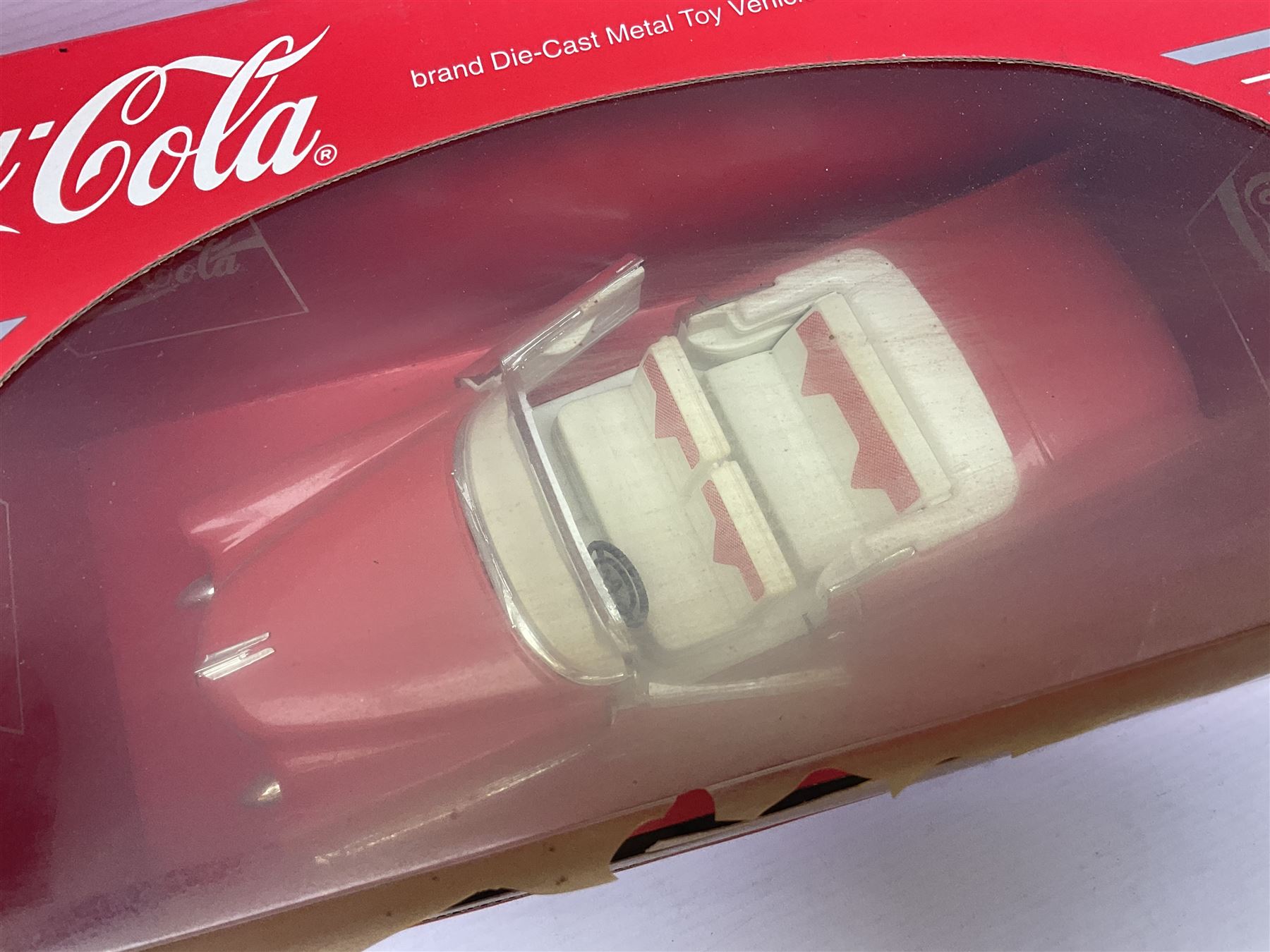 Seven 1:18 scale die-cast models by Ertl, Road legends, Maisto, Solido etc including two Coca Cola promotional vehicles; five boxed (7)