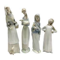 Four Lladro figures, comprising Shepherdess with Dog, no 1034, Girl with Lamb no 4505, Girl with Calla Lilies no 4650 and Gild stretching no 4872, all with original boxes, largest example H28cm