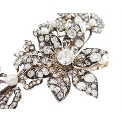19th century gold and silver diamond and pearl en tremblant detachable brooch, the flower tremblant with a principal old cut diamond of approx 1.90 carat, the petals and stamen set with old cut and rose cut diamonds, total diamond weight approx 9.10 carat, to a foliate spray set set with further rose cut diamond and white / pink / cream pearls and ribbon tie