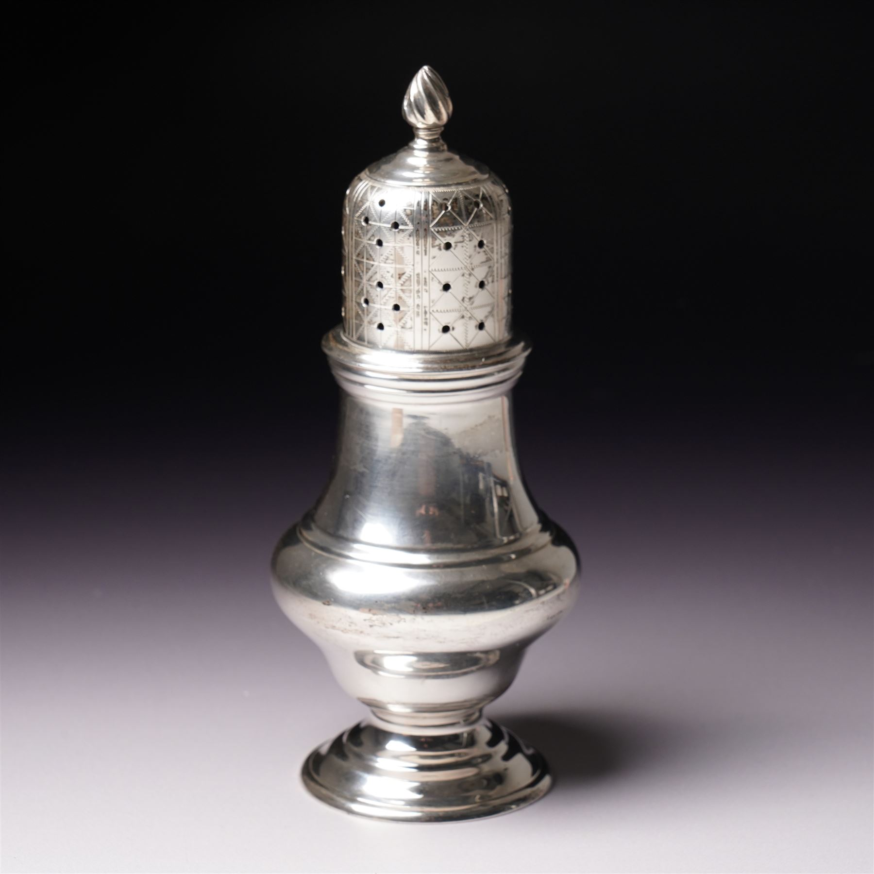 Edwardian silver baluster sugar caster with engraved pierced lid Chester 1905 Maker Haseler Bros.