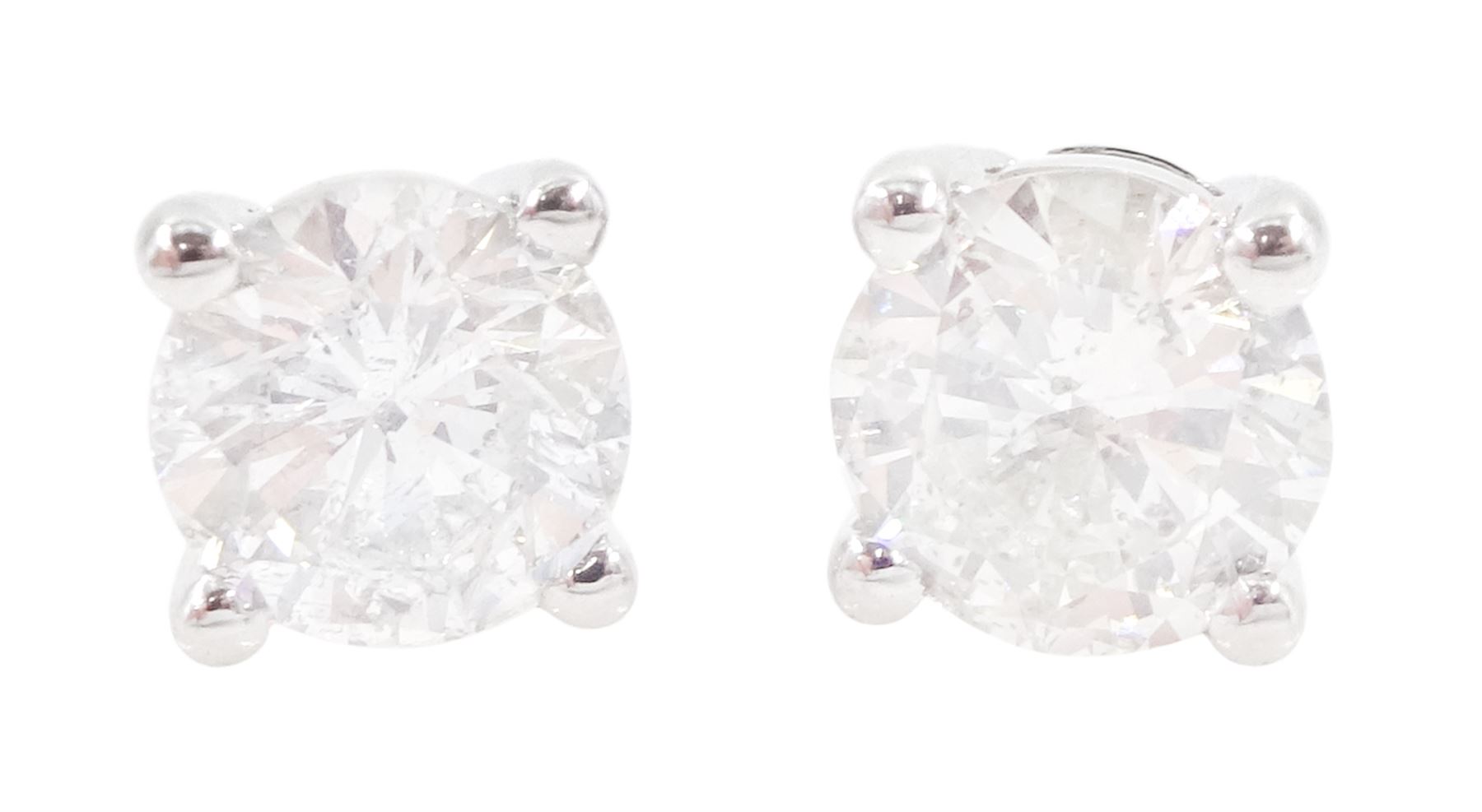 Pair of 18ct white gold round brilliant cut diamond stud earrings, stamped, total diamond weight approx 0.80 carat