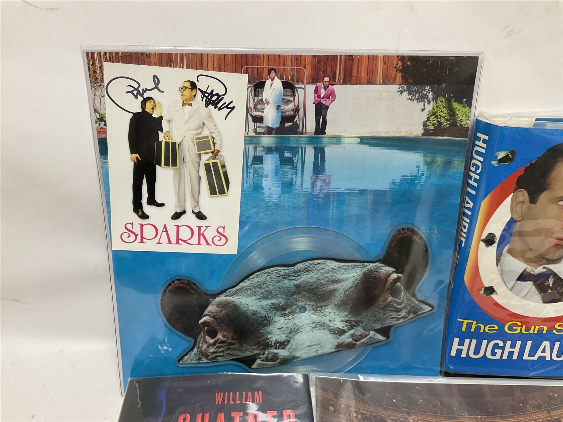 Signed books and ephemera, including Michael Palin Diaries 1969-1979, The Sparks Brothers, Hugh Laurie The Gun Slinger etc 