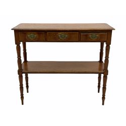 Edwardian pine two tier buffet stand, fitted with three drawers, on turned supports 