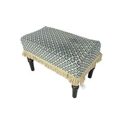 Late 19th century Aesthetic movement ebonised footstool, stuffed seat with blue and white patterned cover with fringing, turned and gilt carved supports 