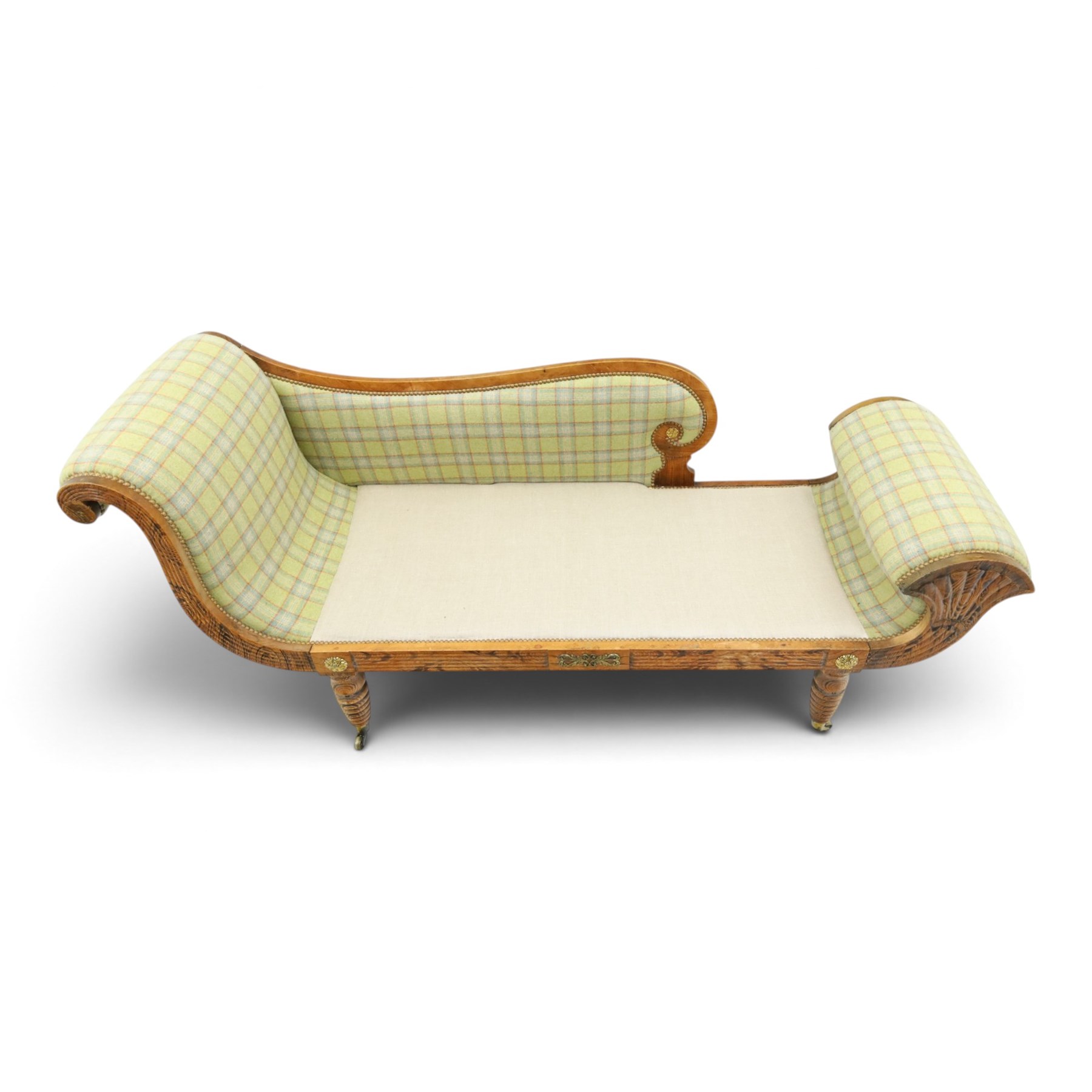  19th century scumbled oak chaise longue upholstered in tartan fabric, swept frame with gilt mounts, studded border with loose base cushion, raised on turned bobbin supports terminating brass castors