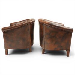 Pair of brown leather tub chairs, with downswept arms with brass studded trim, fixed cushion seat, raised on square tapering supports 