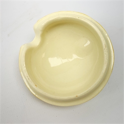 A Clarice Cliff Newport Pottery honey pot, modelled in the form of a beehive and decorated in the Crocus pattern, H10cm.