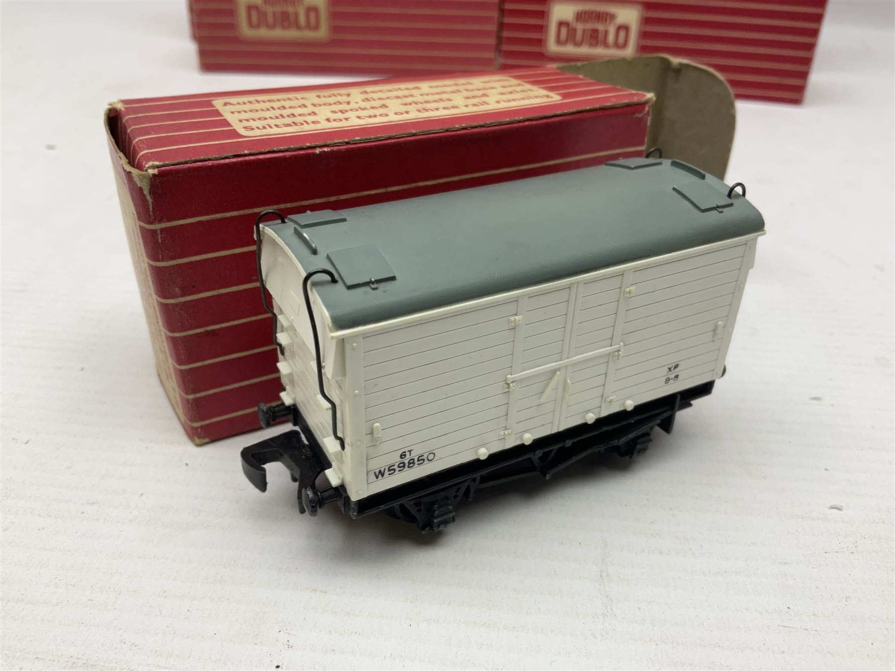 Hornby Dublo - sixteen goods wagons comprising 4644 21-Ton Hopper Wagon, 4315 Horse Box (BR) with horse, 4316 Horse Box (SR) with horse, 4649 Low Sided Wagon with tractor, 4301, 4310, 4311, 4312, 4313, 4320, 4626, 4648, 4652, 4675, 4678 and B550200 (Mineral Wagon); all in red boxes (16)