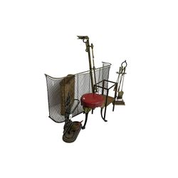 19th century brass and wrought metal fender or spark guard, wicker basket, brass fender, cast iron black finish umbrella and stick stand, fireside tools, cast iron stool and a teak stand (7)