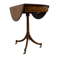 Early 19th century satinwood Pembroke side table, oval moulded drop-leaf top with rosewood band, fitted with single end drawer and false drawer to the opposing end, pressed brass lion mask handles and ivory lozenge escutcheons, on tapered and reed carved stem with four splayed supports, brass cups and castors 

This item has been registered for sale under Section 10 of the APHA Ivory Act
