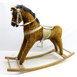  Plush covered rocking horse, with mane, bridal and saddle, on curving rockers, H80cm  