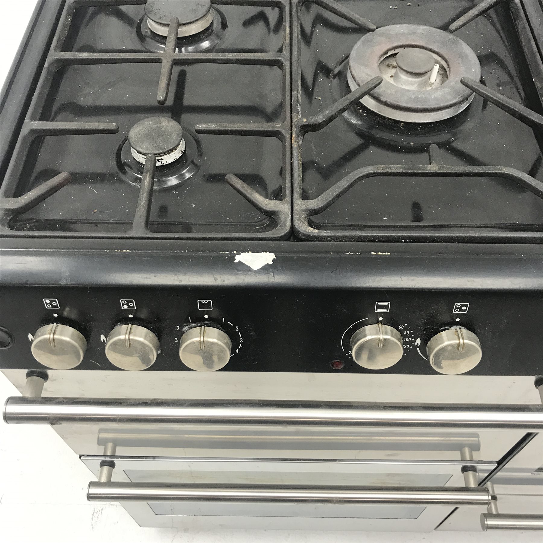 Stoves 050564166 dual fuel Range cooker, seven burner hob,  four cavities (W110cm, H92cm, D65cm) with Stoves 110CH stainless steel chimney hood  (W109cm, H33cm, D50cm)