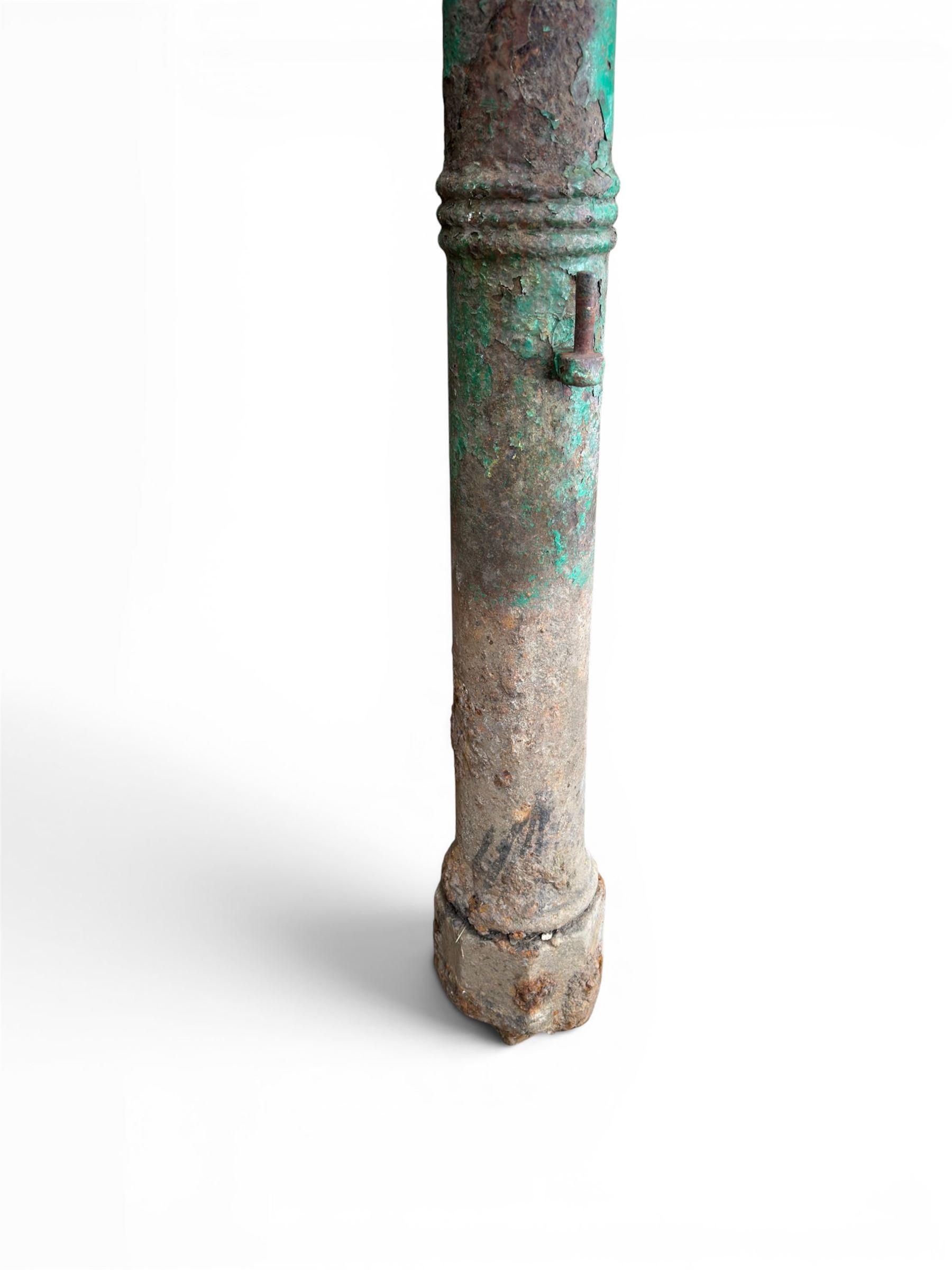 19th century circular cast iron gate post with finial, painted in distressed green finish