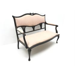 Edwardian mahogany two seat settee, shaped cresting rail upholstered in studded pink fabric, cabriole legs 