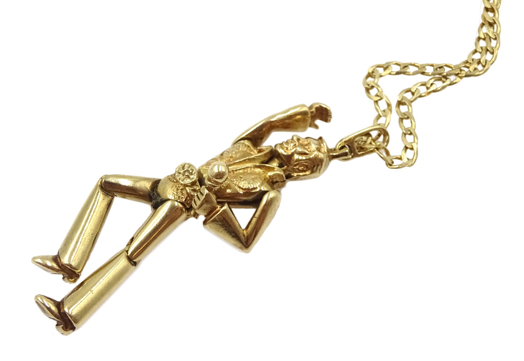 Gold Elvis Presley pendant, on gold flattened curb chain, both hallmarked 9ct