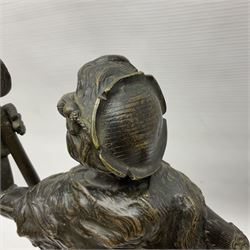 Pair of bronzed figure modelled as a hunter in traditional dress, each holding a pike, H48cm