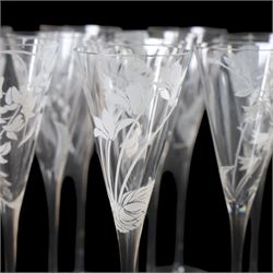 Twelve Crystal champagne glasses Les Fleurs, issued by the Franklin Mint in collaboration with Perrier Jouet, each glass is etched with a different flower, all boxed 