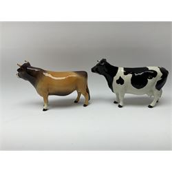 Two Beswick models, comprising Jersey bull model no 1422, H11.5cm, and Friesian cow model no 1362a, H11.5cm, both with printed mark beneath. 