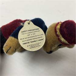 Group of five teddy bears comprising ‘George’ a unique pellet filled bear with glass eyes and velvet paws H38cm, and ‘Abbey’ a luxury German plush with wobble head and glass eyes no.5/10 H24cm, both with Teddies from Bearyland labels; along with two light blonde mohair H. M. Bears and Boyds Bears ‘T. F. Wuzzies’ no. 595140 (5)