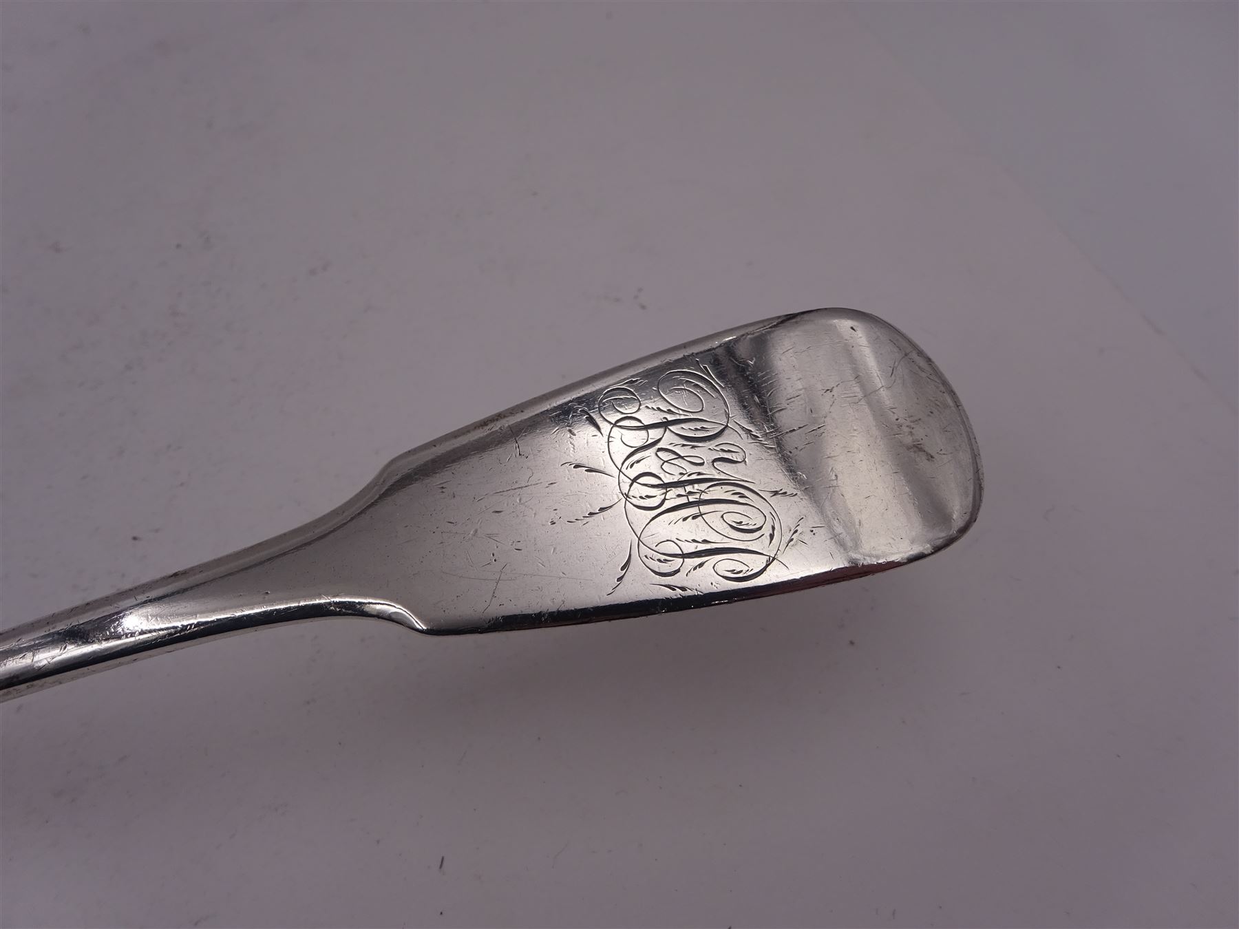 George III silver Fiddle pattern fish slice, engraved with floral pattern to blade and initials to terminal, hallmarked Thomas James, London 1814, L29.6cm