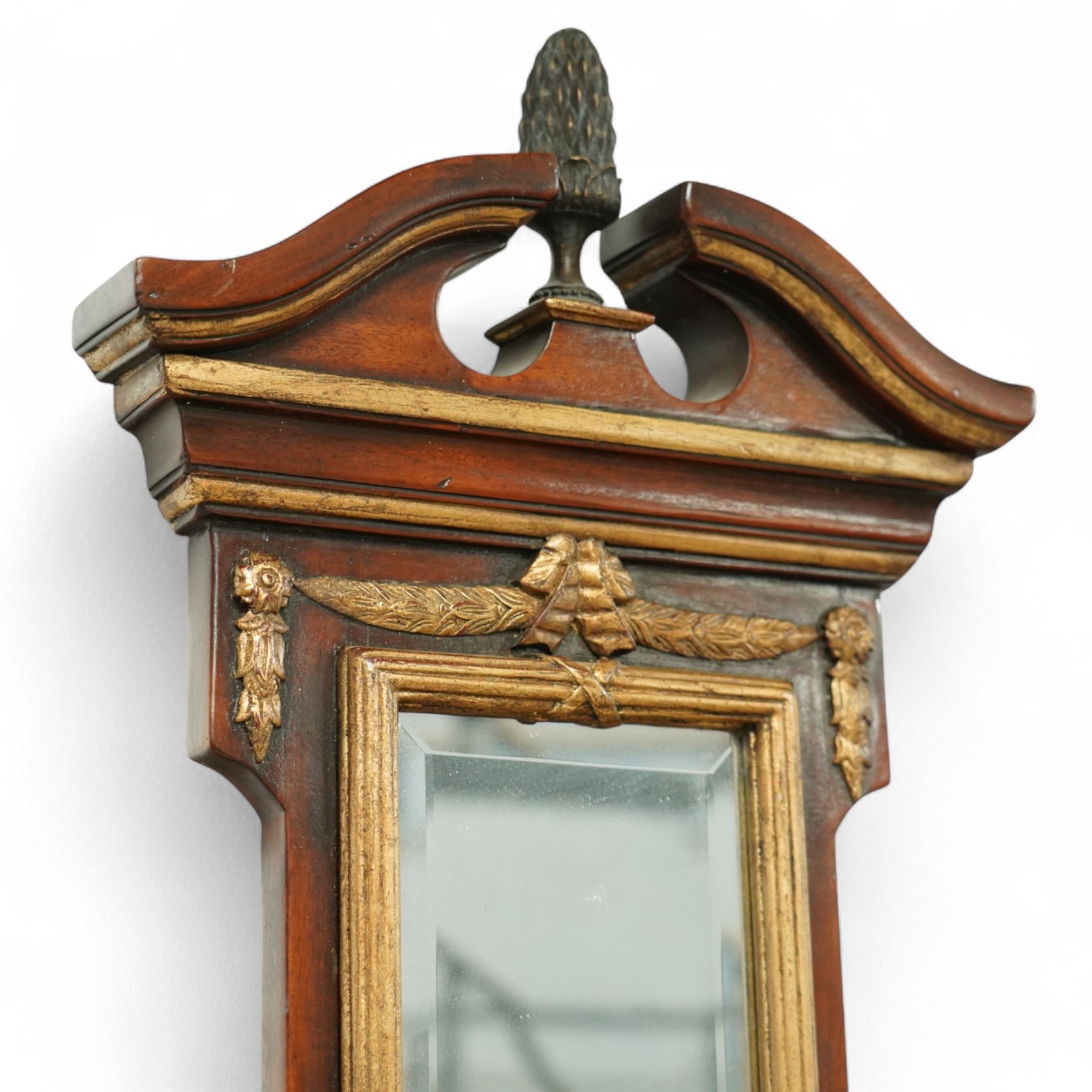 Theodore Alexander - three contemporary neoclassical design giltwood and mahogany three-sectional pier mirrors, broken pediment with central bronze urn finial above triple mirror plates, flanked by gilt acanthus-carved supports and moulded frame 
