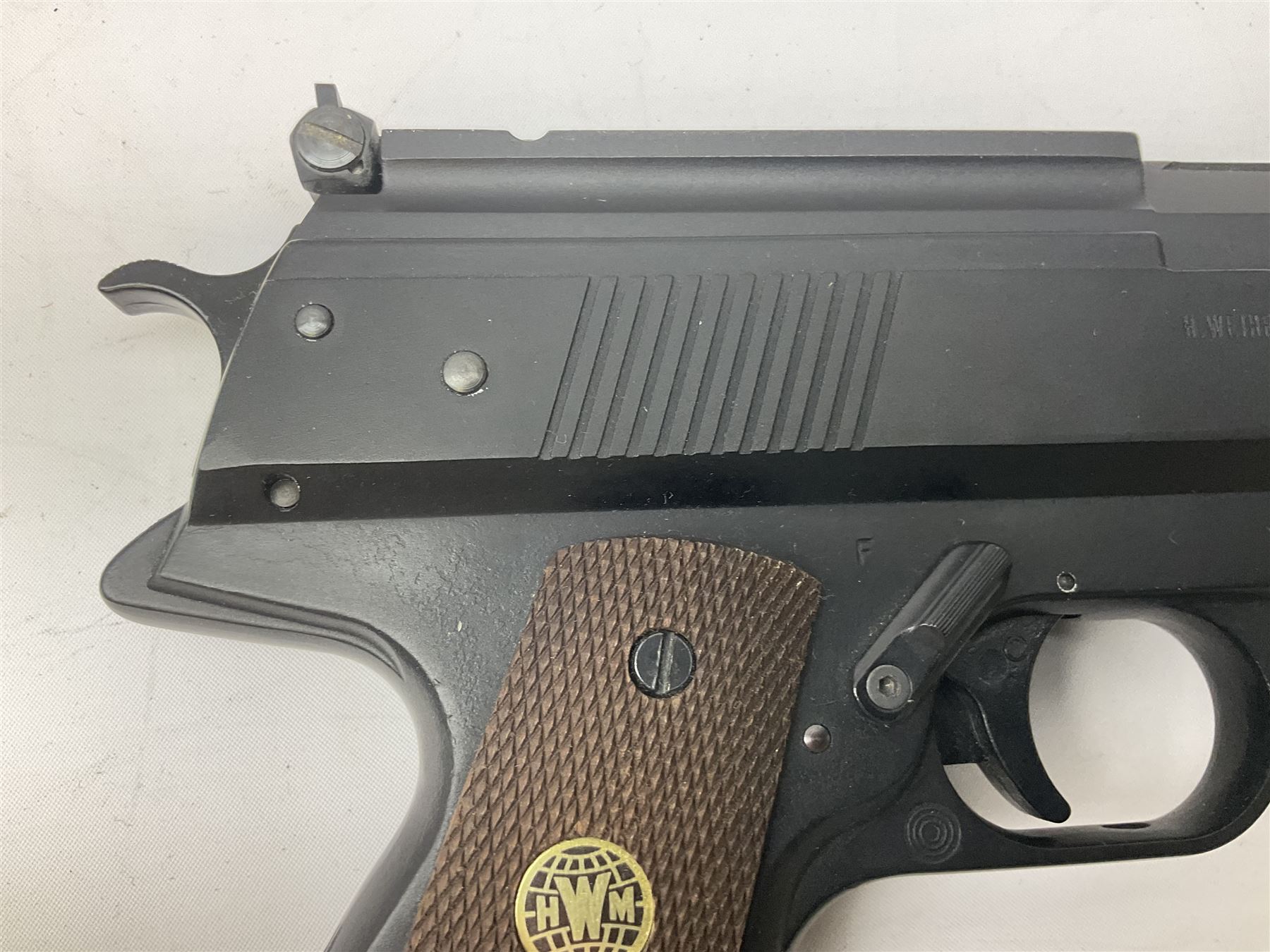 H. Weihrauch HW45 air pistol, .177 calibre, over-lever mechanism, chequered grip No.372679 L31cm; and quantity of pellets